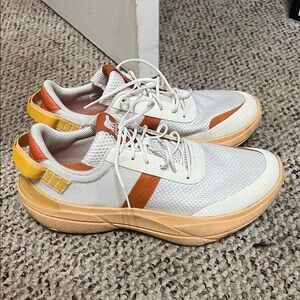 Sorel Women's White Athletic Sneakers with Orange and Yellow Accents